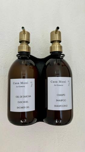 two bottles of soap sitting next to each other at Casa Moni con Vistas al Mar in Playa de Santiago