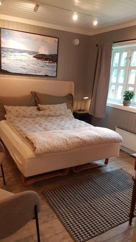 Postel nebo postele na pokoji v ubytování Leka Overnatting