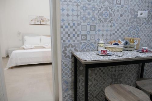 Postel nebo postele na pokoji v ubytování casa vacanza la Farfalla