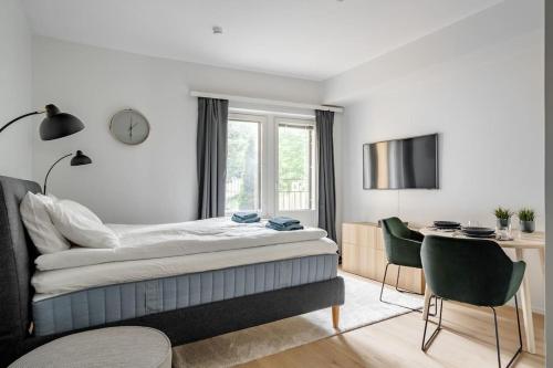 Et tv og/eller underholdning på Brand new apartment - Minerva