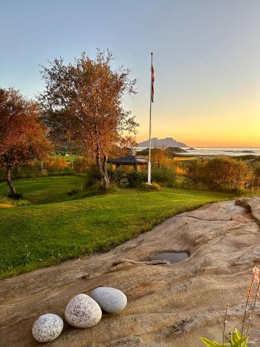 a group of rocks sitting on a dirt road at Amazing seaview - Lodge in Bodø