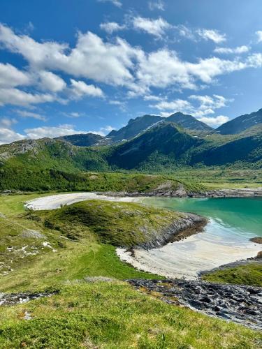 a view of a river and mountains at Amazing seaview - Lodge in Bodø