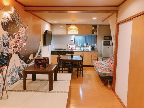 Køkken eller tekøkken på The garden inn Osaka Dome