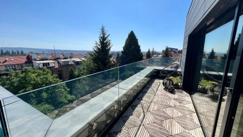 Μπαλκόνι ή βεράντα στο Apartmán se saunou a terasou s výhledem na Brno