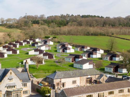 an aerial view of a village with houses at Harcombe House Bungalow 3 in Newton Abbot