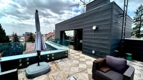 Apartmán se saunou a terasou s výhledem na Brno