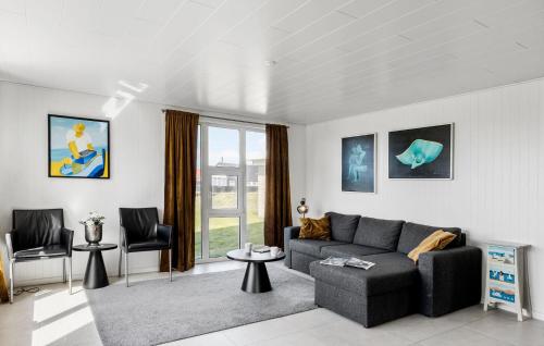 a living room with a couch and two chairs at Beautiful Home In Thisted With Wifi in Thisted