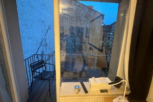 Μπαλκόνι ή βεράντα στο Petit Hollywood 2 personnes