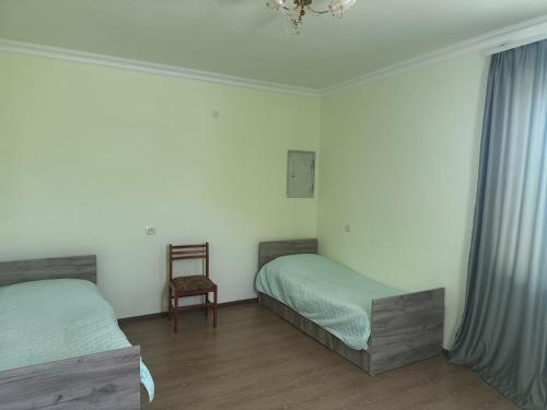 Postel nebo postele na pokoji v ubytování Armani Guest house