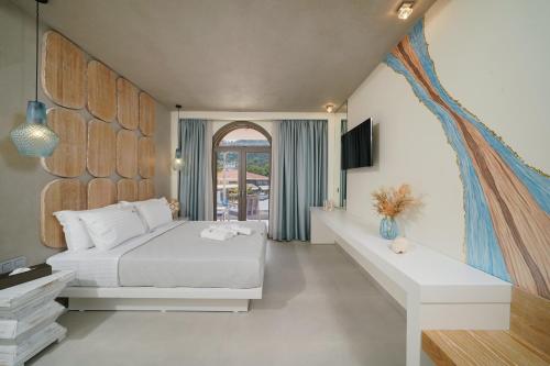 Postel nebo postele na pokoji v ubytování Moderi Luxury Suites