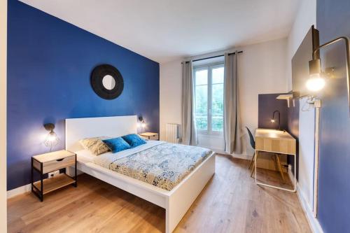Ένα ή περισσότερα κρεβάτια σε δωμάτιο στο Appartement Rénové