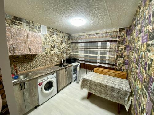 Cuina o zona de cuina de Апартаменты