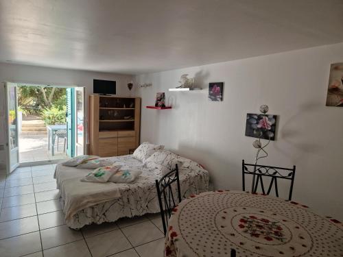 Ένα ή περισσότερα κρεβάτια σε δωμάτιο στο Casa Prescilia