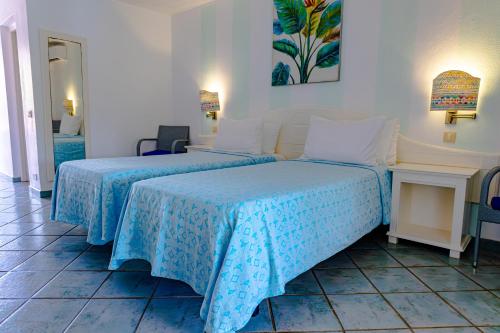 Ocean Point Beach Resort & Spa Adults Onlyにあるベッド