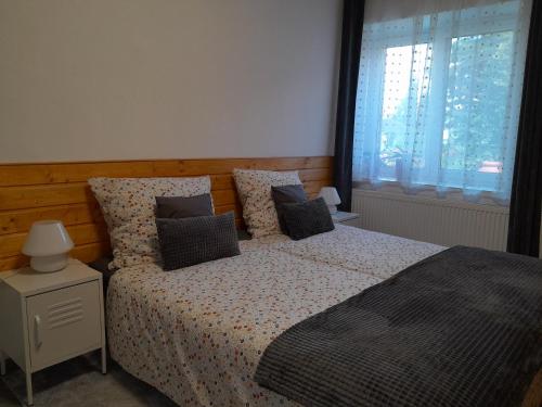 Postel nebo postele na pokoji v ubytování Apartmán Maya