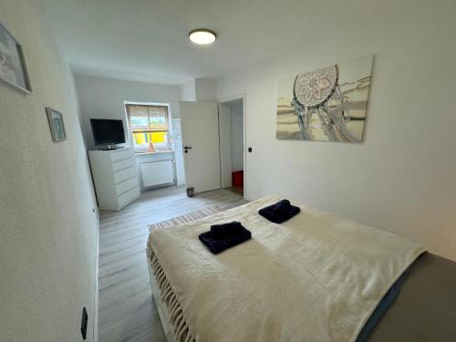 Ένα ή περισσότερα κρεβάτια σε δωμάτιο στο BOHO Apartment Vintage nähe Salzburg