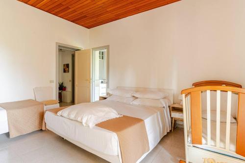 Ένα ή περισσότερα κρεβάτια σε δωμάτιο στο Villa Calipso