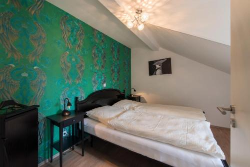 Łóżko lub łóżka w pokoju w obiekcie Ferienwohnung Ruraue