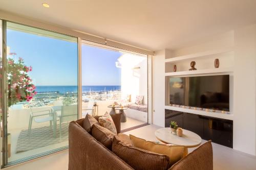 MARBELLA BANUS SUITES - Brand New Exclusive Puerto Banús Port Seafront Apartment - 2BR - 2BA - Outdoor Terrace - Spectacular Mediterranean Views - Heart of Puerto Banús Marina - Steps from El Corte Ing Luxury Shopping