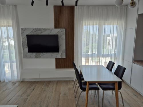 Μια τηλεόραση ή/και κέντρο ψυχαγωγίας στο Frekuenca Apartments