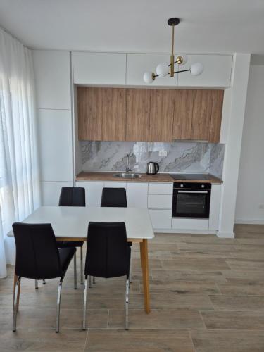 Η κουζίνα ή μικρή κουζίνα στο Frekuenca Apartments