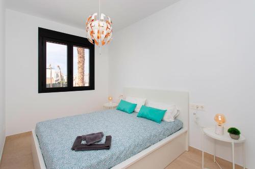 En eller flere senge i et værelse på Villa el raso