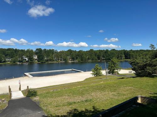 a view of a skate park next to a lake at Majestic Lake Front Chalet in Tobyhanna