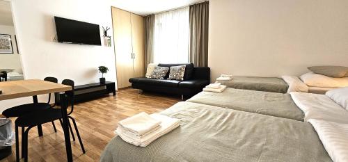 Postel nebo postele na pokoji v ubytování Airport Messe Hotel