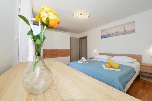 Katil atau katil-katil dalam bilik di Apartman Vitali