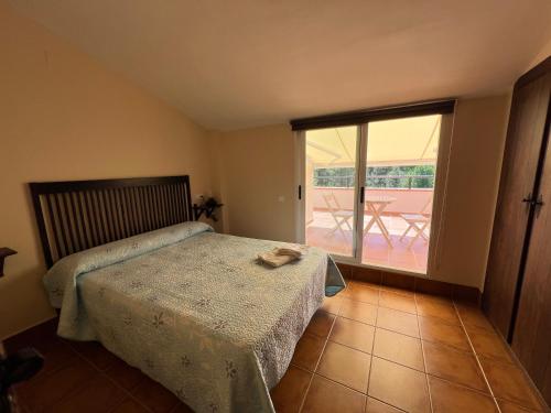 A bed or beds in a room at Dúplex Río Madera