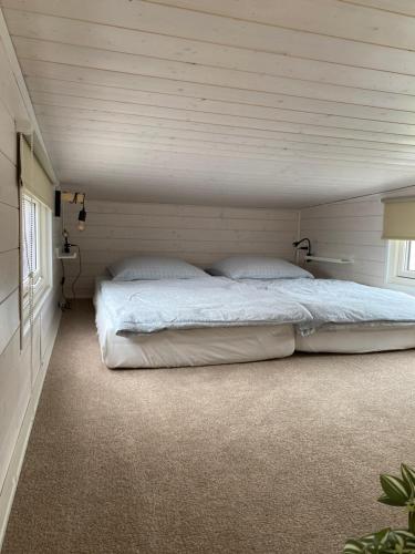 Postel nebo postele na pokoji v ubytování Tiny House Eberswalde Nähe Zentrum