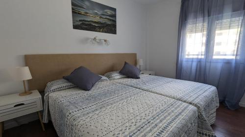 Un ou plusieurs lits dans un hébergement de l'établissement A 2 minutos del mar en Jávea