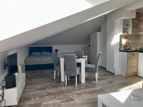 Postel nebo postele na pokoji v ubytování Apartman 24