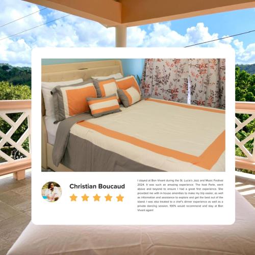 a poster of a bed with orange and grey pillows at Serene Mountain View Smart Apt for Restful Stays in Castries