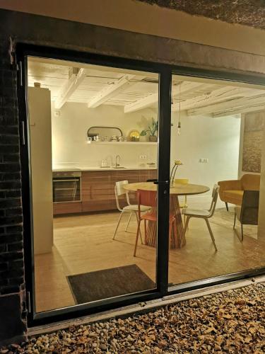 Ruang duduk di Slapen in een oude stal ('Het Oude Wezeveld')