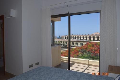 En eller flere senge i et værelse på Sun Bay Villa nº47