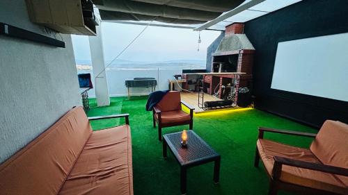 Posezení v ubytování Duplex moderne elkala