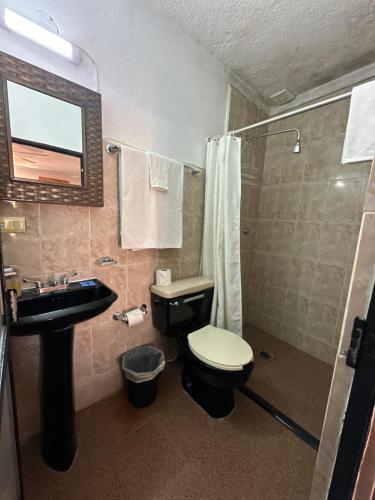 Koupelna v ubytování Hotel del Sol