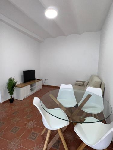 TV a/nebo společenská místnost v ubytování APARTAMENTO LA MURALLA