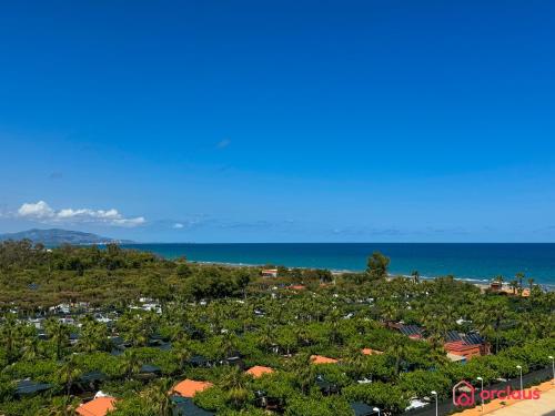 an aerial view of a resort and the ocean at Verano Azul in Cabanes