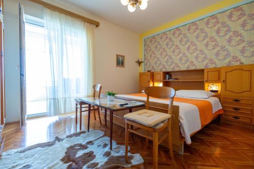 Posteľ alebo postele v izbe v ubytovaní Marin Apartments