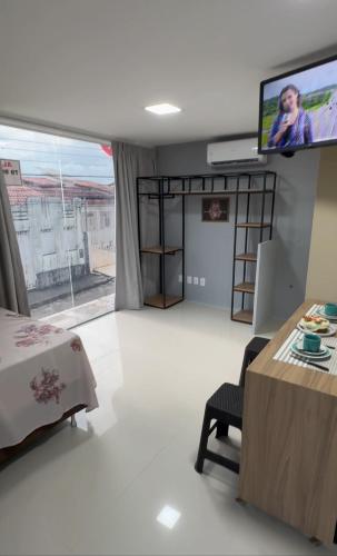 TV a/nebo společenská místnost v ubytování Residencial Baruk Adonai