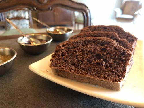 a plate with three slices of cake on a table at Cicapuy in Puys