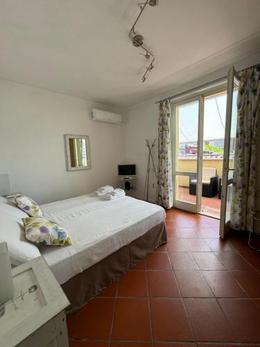 Katil atau katil-katil dalam bilik di Alice&Luna's Apartaments Sirmione