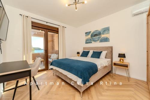 Postel nebo postele na pokoji v ubytování Apartman Cvita Rtina