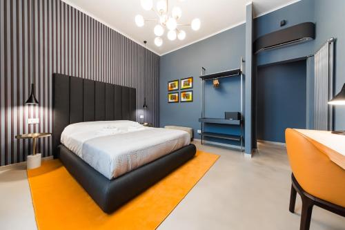 Ένα ή περισσότερα κρεβάτια σε δωμάτιο στο macan suite rooms