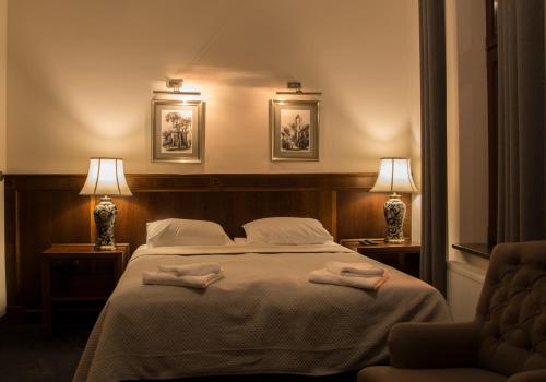 Hotel Retro B.A. Zientarskiにあるベッド