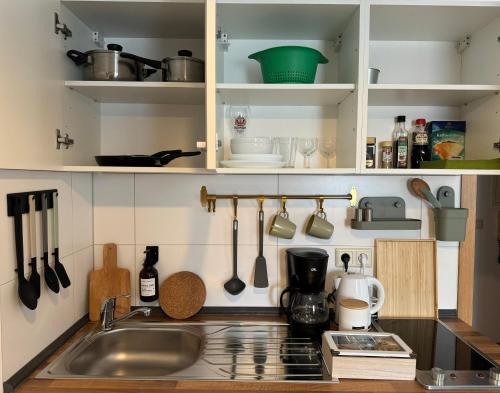 Küche/Küchenzeile in der Unterkunft “Sweet boho penthouse” in city center
