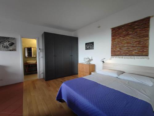 Ein Bett oder Betten in einem Zimmer der Unterkunft La Terrazza