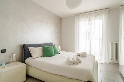 Postel nebo postele na pokoji v ubytování Dalmine Luxury Suite